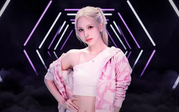 5K Ultra HD PC wallpaper of a blonde model in a pink patterned jacket and white crop top posing confidently against neon geometric stage lights, K-pop–styled.