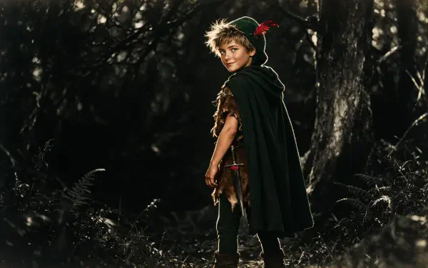 4K Ultra HD PC desktop wallpaper: a child in a Peter Pan–style elf costume with green cloak and feathered cap, standing in a shadowy forest and glancing back.