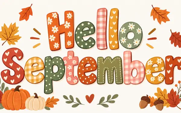 Whimsical Hello September lettering surrounded by pumpkins, autumn leaves and acorns — warm 4K Ultra HD PC desktop wallpaper/background celebrating September and the autumn season.