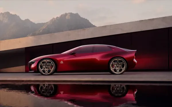 Red Alfa Romeo Cuorerosso concept sports car with Ferrari-inspired styling, reflected on a pool beneath mountain scenery, HD desktop wallpaper.