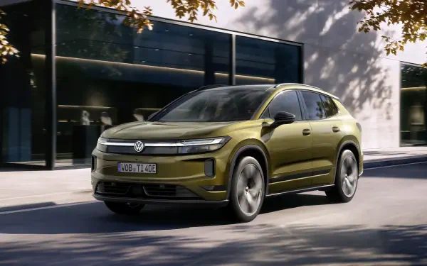 Olive Volkswagen ID. Tiguan SUV parked on a city street, 4K Ultra HD PC desktop wallpaper and background.