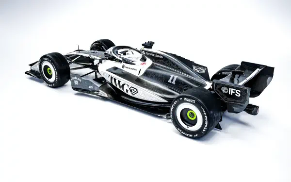 Cadillac MAC-26 Formula One race car in black and white, featured in an 8K Ultra HD PC desktop wallpaper background.