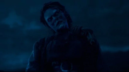 HD PC desktop wallpaper from the movie Season of the Witch (2011): a grim, mud-streaked medieval man gazes upward in moonlit blue gloom.