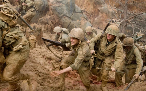 HD PC desktop wallpaper from TV show The Pacific (2010): WWII US Marines in helmets and packs scrambling up a muddy, rocky beach amid smoke and chaos.