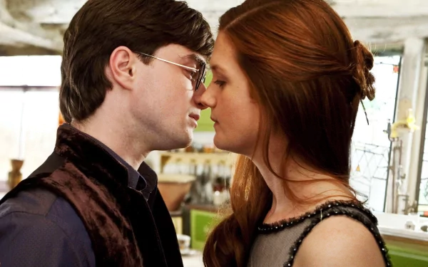 HD PC desktop wallpaper featuring an intimate close-up scene from the movie Harry Potter and the Deathly Hallows: Part 2, showing two characters nearly touching foreheads.
