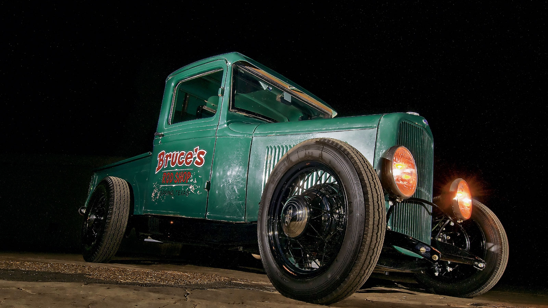 1932 Ford BB vintage vehicle parked on a city street.