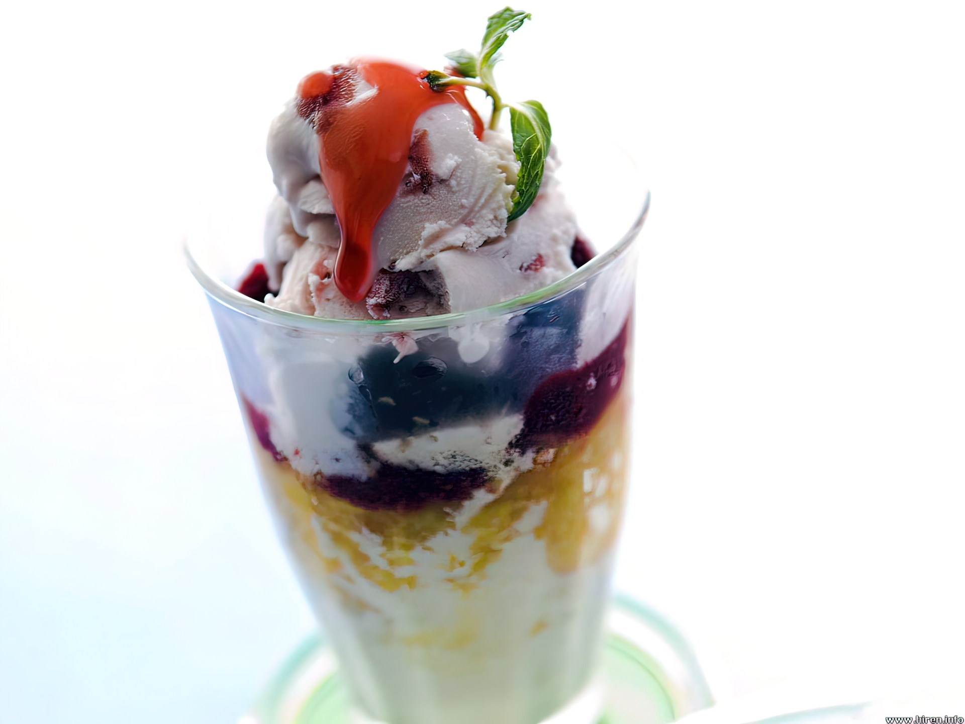 Delicious ice cream sundae with colorful toppings and a cherry on top