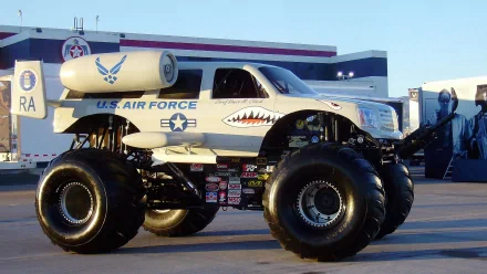 A striking HD wallpaper featuring a U.S. Air Force-themed monster truck with large tires, showcasing its unique design and powerful presence.