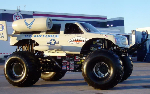 A striking HD wallpaper featuring a U.S. Air Force-themed monster truck with large tires, showcasing its unique design and powerful presence.