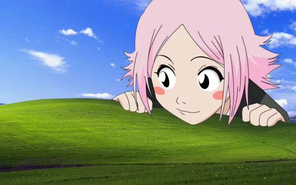 A whimsical HD wallpaper featuring Yachiru Kusajishi from the anime Bleach, playfully peeking over a vibrant green hill under a bright blue sky.