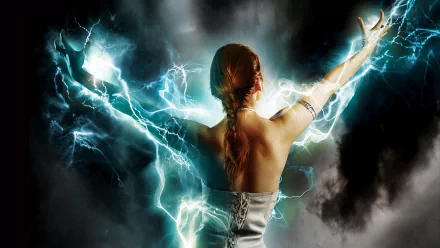 A powerful fantasy scene featuring a witch with outstretched arms surrounded by blue lightning, set against a dark, mystical background. This HD wallpaper captures magical energy.