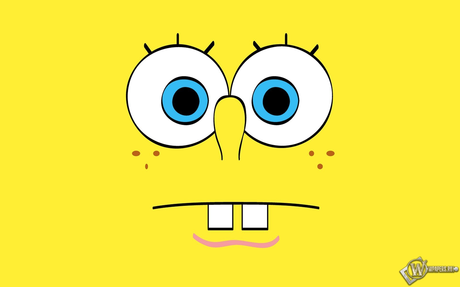 HD PC desktop wallpaper featuring a close-up of SpongeBob SquarePants' face with a bright yellow background from the TV show SpongeBob SquarePants.