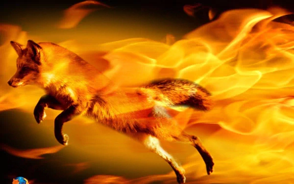 HD PC desktop wallpaper featuring a fiery fox in motion, blending technology and FireFox themes with vibrant flames and dynamic energy.