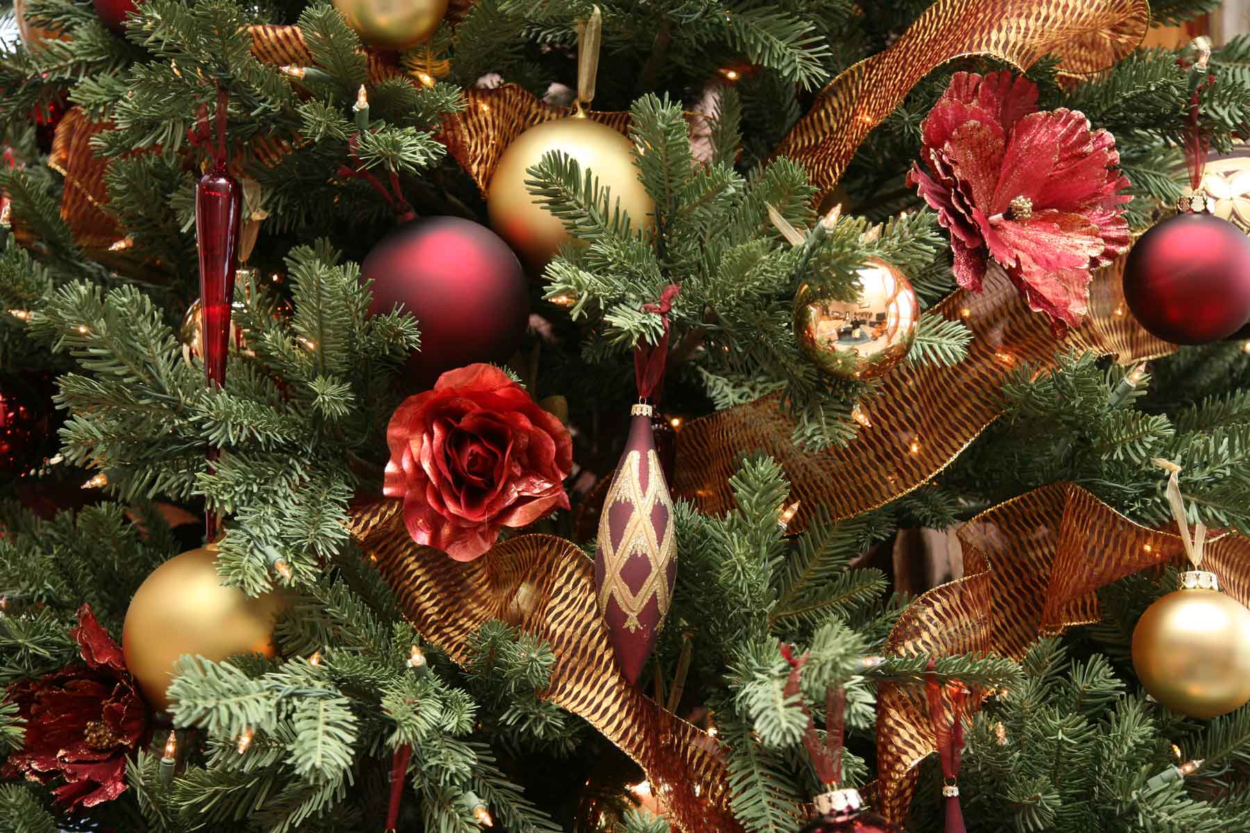 Colorful Christmas tree ornaments on a festive background.