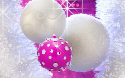 HD desktop wallpaper featuring white and purple Christmas ornaments with rhinestone accents set against a sparkling holiday background.
