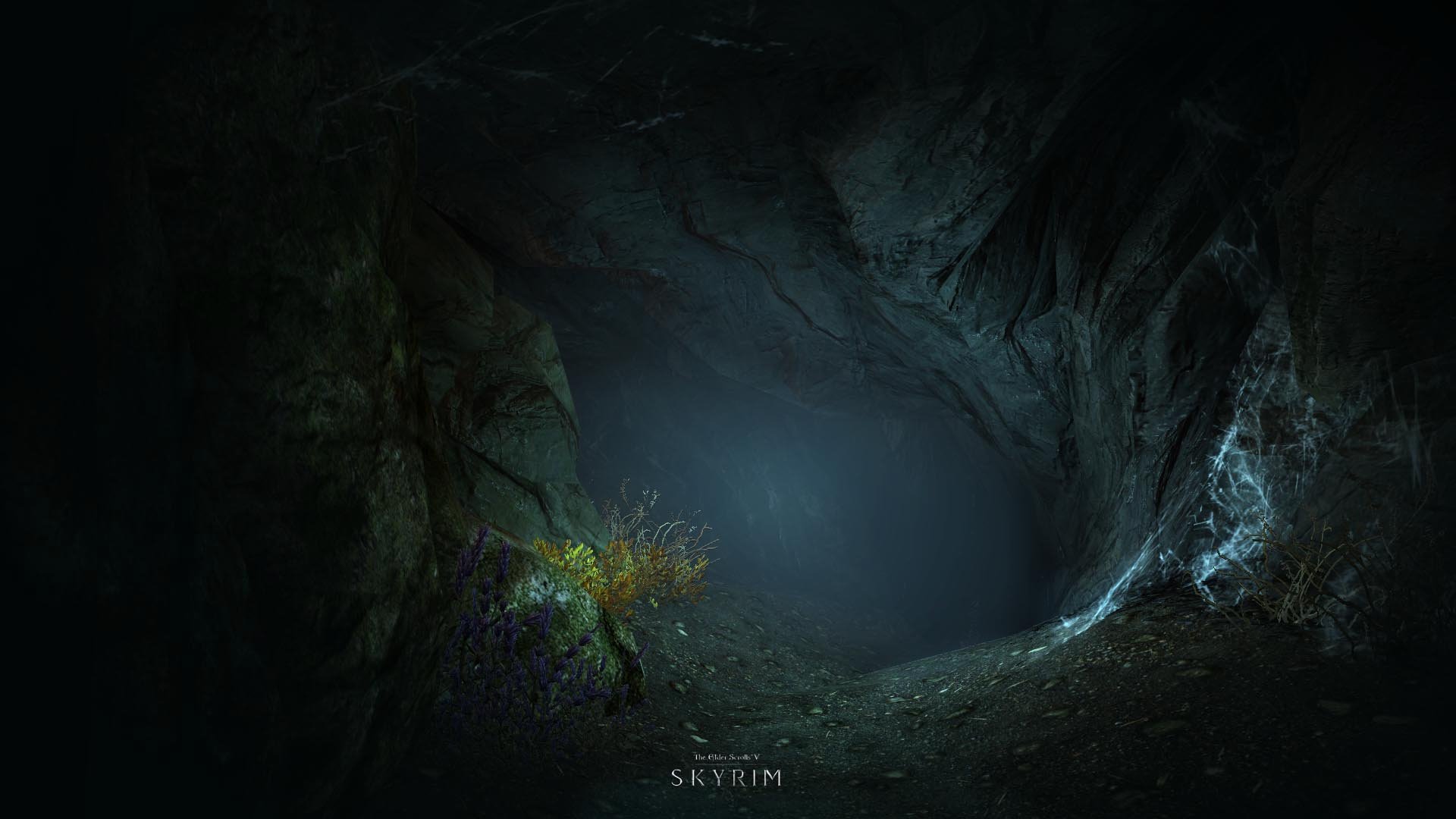A dark cave scene from The Elder Scrolls V: Skyrim, featuring eerie lighting and colorful flora, serves as an atmospheric HD wallpaper for fans of the video game series.