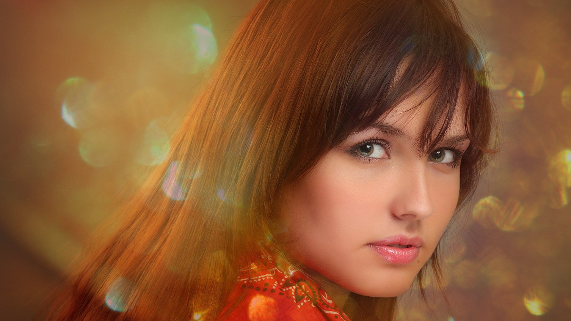 Artistic HD desktop wallpaper featuring a woman with long hair and a thoughtful expression, set against a warm, bokeh-lit background.