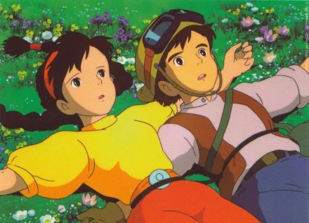 HD desktop wallpaper from Studio Ghibli's anime Laputa: Castle in the Sky, featuring the main characters lying on a vibrant flower-filled field.
