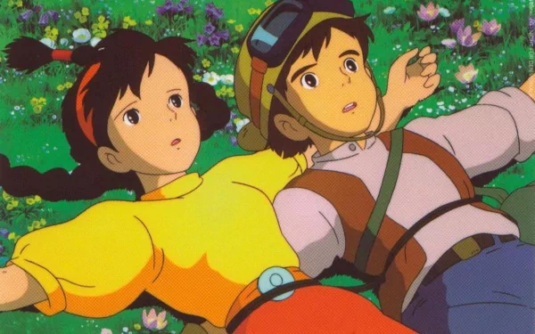 HD desktop wallpaper from Studio Ghibli's anime Laputa: Castle in the Sky, featuring the main characters lying on a vibrant flower-filled field.