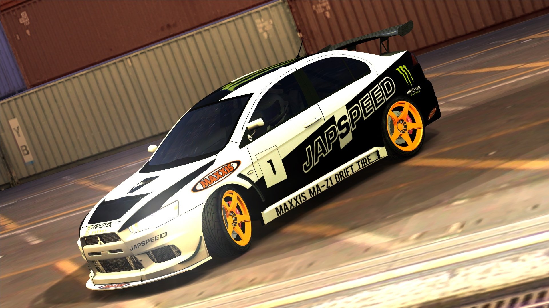 HD PC desktop wallpaper featuring a white-and-black JAPSPEED racing sports car with yellow rims and sponsor decals on tarmac.