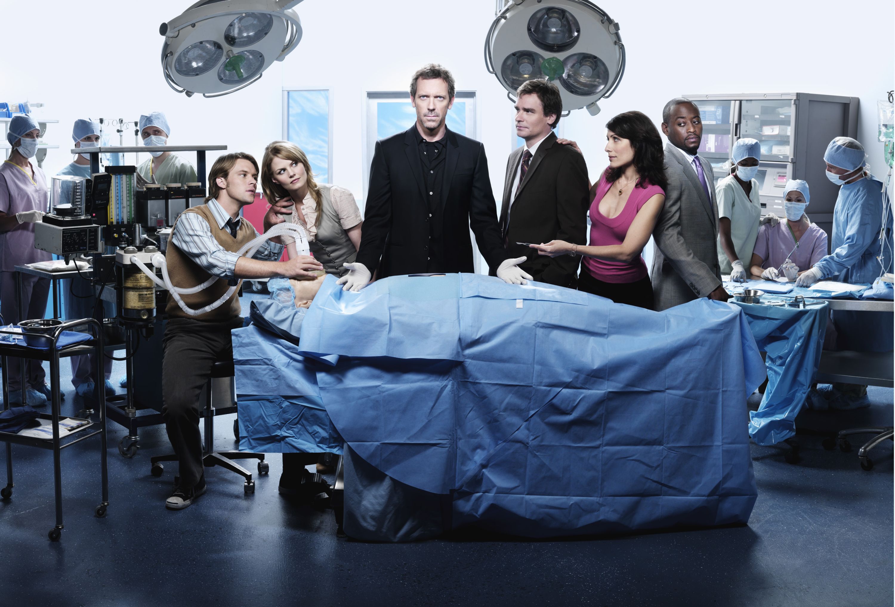 Gregory House, Lisa Cuddy, Eric Foreman, James Wilson, and others gather together.
