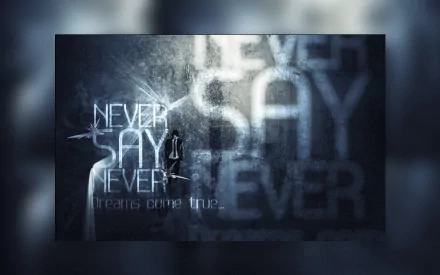 HD desktop wallpaper featuring the phrase Never Say Never with Justin Bieber's name, set against a dark, textured background with dream-like lighting.