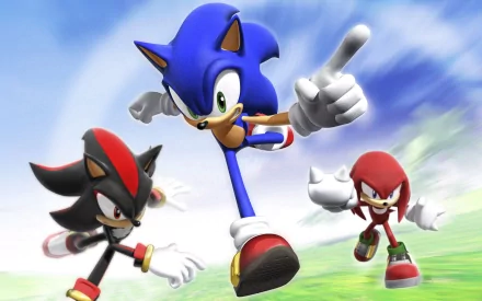 HD PC wallpaper featuring Sonic the Hedgehog, Shadow the Hedgehog, and Knuckles the Echidna from the video game Sonic Rivals in dynamic running poses.