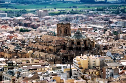 A tilt-shift photography image showcasing a detailed miniature-like cityscape, captured in high definition as a PC desktop wallpaper and background.