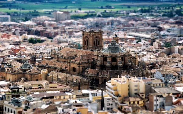 A tilt-shift photography image showcasing a detailed miniature-like cityscape, captured in high definition as a PC desktop wallpaper and background.