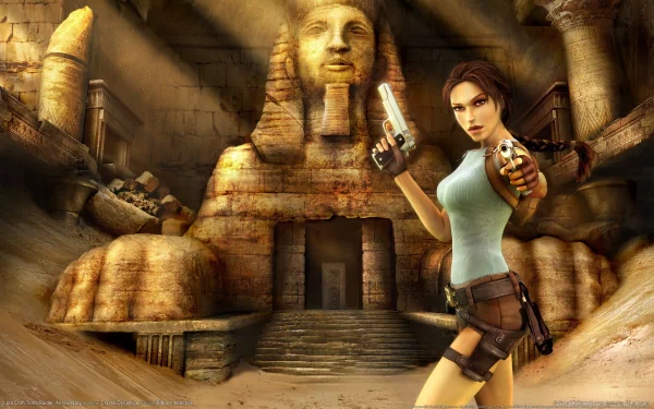A high-definition PC desktop wallpaper featuring Lara Croft from Tomb Raider, armed and poised in front of a majestic Sphinx, set in an ancient, mysterious environment.