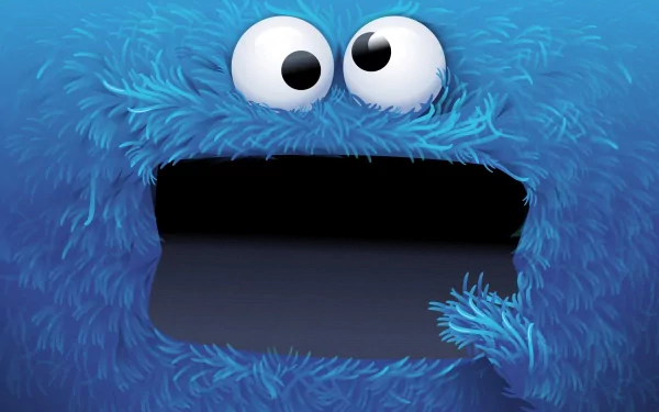 HD desktop wallpaper of a blue cartoon monster from the TV show Sesame Street, featuring the character's wide eyes and furry texture.