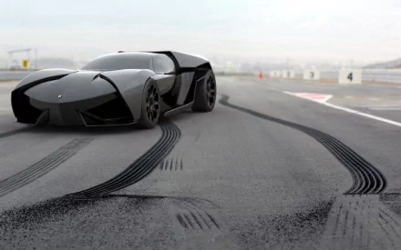 A striking concept car from Lamborghini, featuring a sleek black design, parked on a racetrack with prominent tire marks, showcased as a high-definition desktop wallpaper.