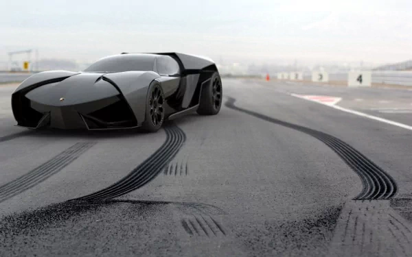 A striking concept car from Lamborghini, featuring a sleek black design, parked on a racetrack with prominent tire marks, showcased as a high-definition desktop wallpaper.