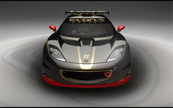 HD desktop wallpaper featuring a sleek black Lotus race car with red accents, viewed from the front against a gray gradient background.