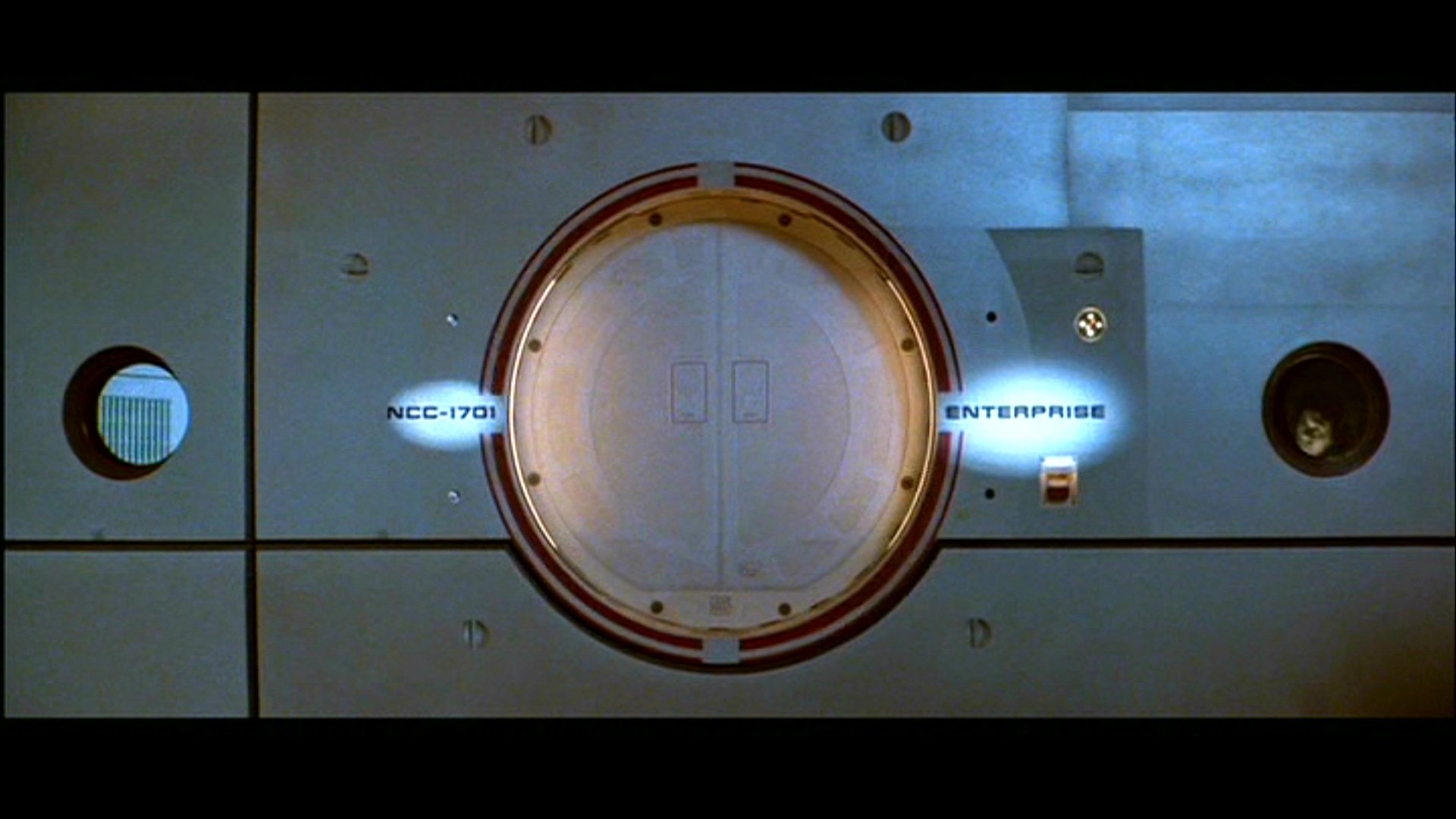HD PC wallpaper: close-up of the USS Enterprise circular hatch/tube marked NCC-1701, from the movie Star Trek II: The Wrath of Khan.