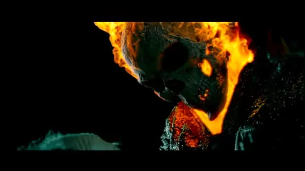 HD PC desktop wallpaper and background from the movie Ghost Rider: Spirit of Vengeance — close-up of the flaming skull rider, bright orange flames against a dark teal backdrop.