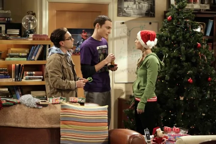 HD desktop wallpaper featuring Kaley Cuoco as Penny, Jim Parsons as Sheldon Cooper, and Johnny Galecki as Leonard Hofstadter from The Big Bang Theory TV show during Christmas.