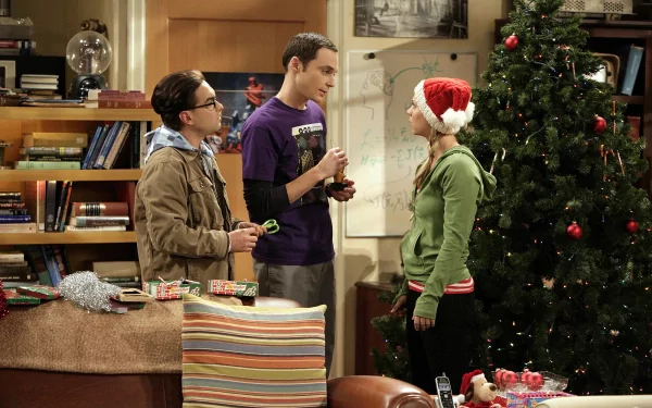 HD desktop wallpaper featuring Kaley Cuoco as Penny, Jim Parsons as Sheldon Cooper, and Johnny Galecki as Leonard Hofstadter from The Big Bang Theory TV show during Christmas.
