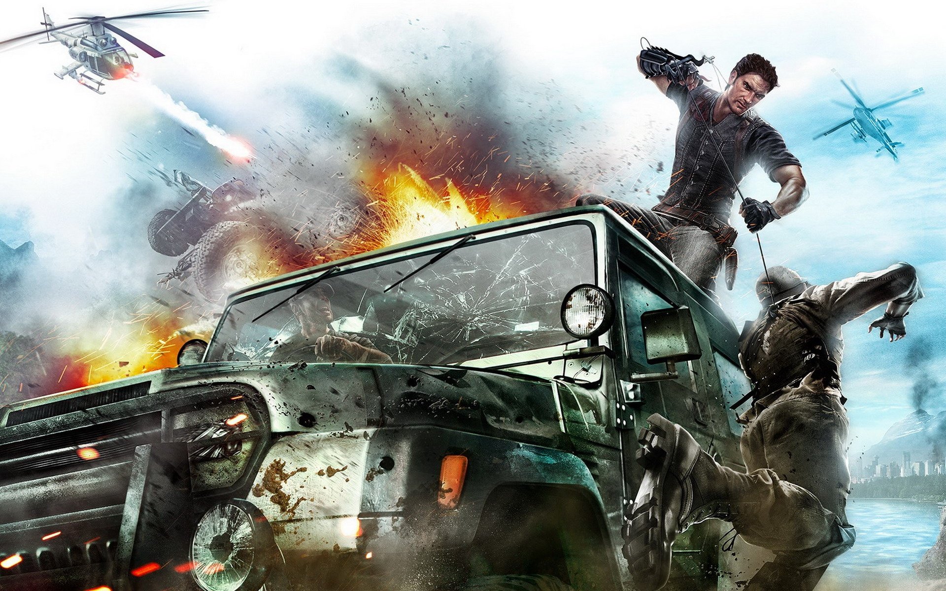 HD PC desktop wallpaper from the video game Just Cause 2, featuring an intense action scene with a character, explosion, helicopters, and a rugged vehicle.