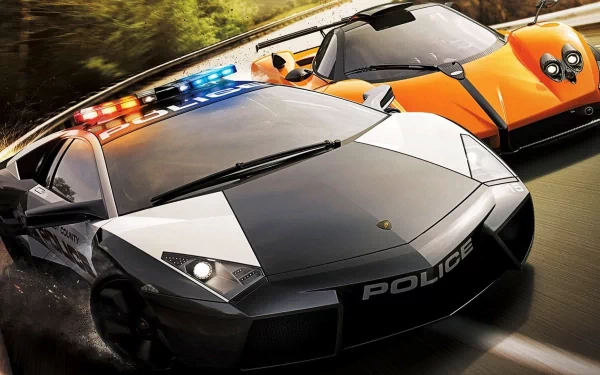 HD PC desktop wallpaper background from the video game Need For Speed: a police Lamborghini with lights blazing chases an orange supercar down a forested highway.