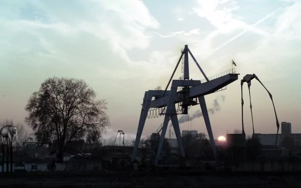A dramatic HD desktop wallpaper featuring an industrial crane silhouette against a sunset sky, inspired by the atmosphere of the video game Half-Life 2.