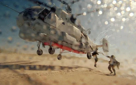 HD PC desktop wallpaper: military Kamov Ka-27 helicopter hovers over sandy terrain as crew sprint beneath, sand and spray blurring the foreground for a dramatic background.