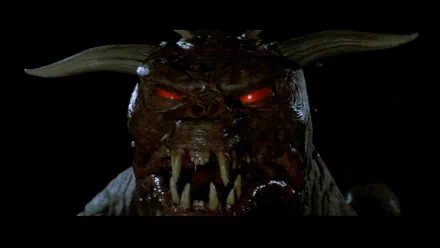 HD PC desktop wallpaper: snarling horned demon with glowing red eyes from the movie Ghostbusters, shown close-up against a black background.