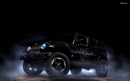 HD desktop wallpaper featuring a rugged black Jeep Wrangler amid a misty, dark background. The vehicle's distinctive design and headlights stand out, emphasizing its powerful and adventurous aura.