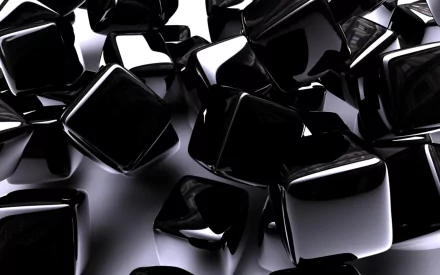 A high-definition, 3D CGI abstract image featuring glossy black cubes scattered randomly, creating a visually engaging desktop wallpaper and background.