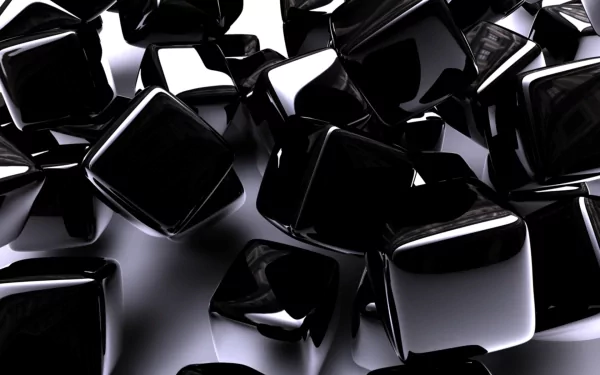 A high-definition, 3D CGI abstract image featuring glossy black cubes scattered randomly, creating a visually engaging desktop wallpaper and background.
