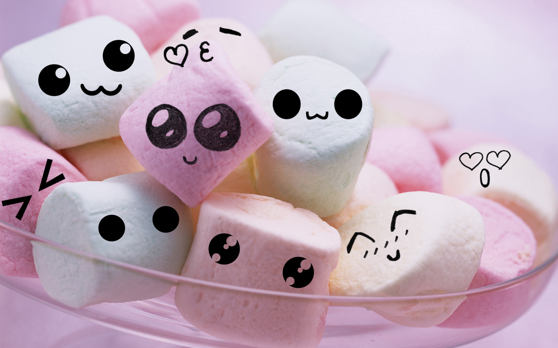Colorful marshmallow treats on a vibrant desktop wallpaper.