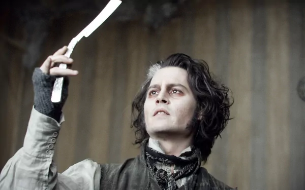 Johnny Depp as Sweeney Todd holds a razor in a dramatic scene from *Sweeney Todd: The Demon Barber of Fleet Street in Concert*. HD wallpaper featuring the film's dark atmosphere.