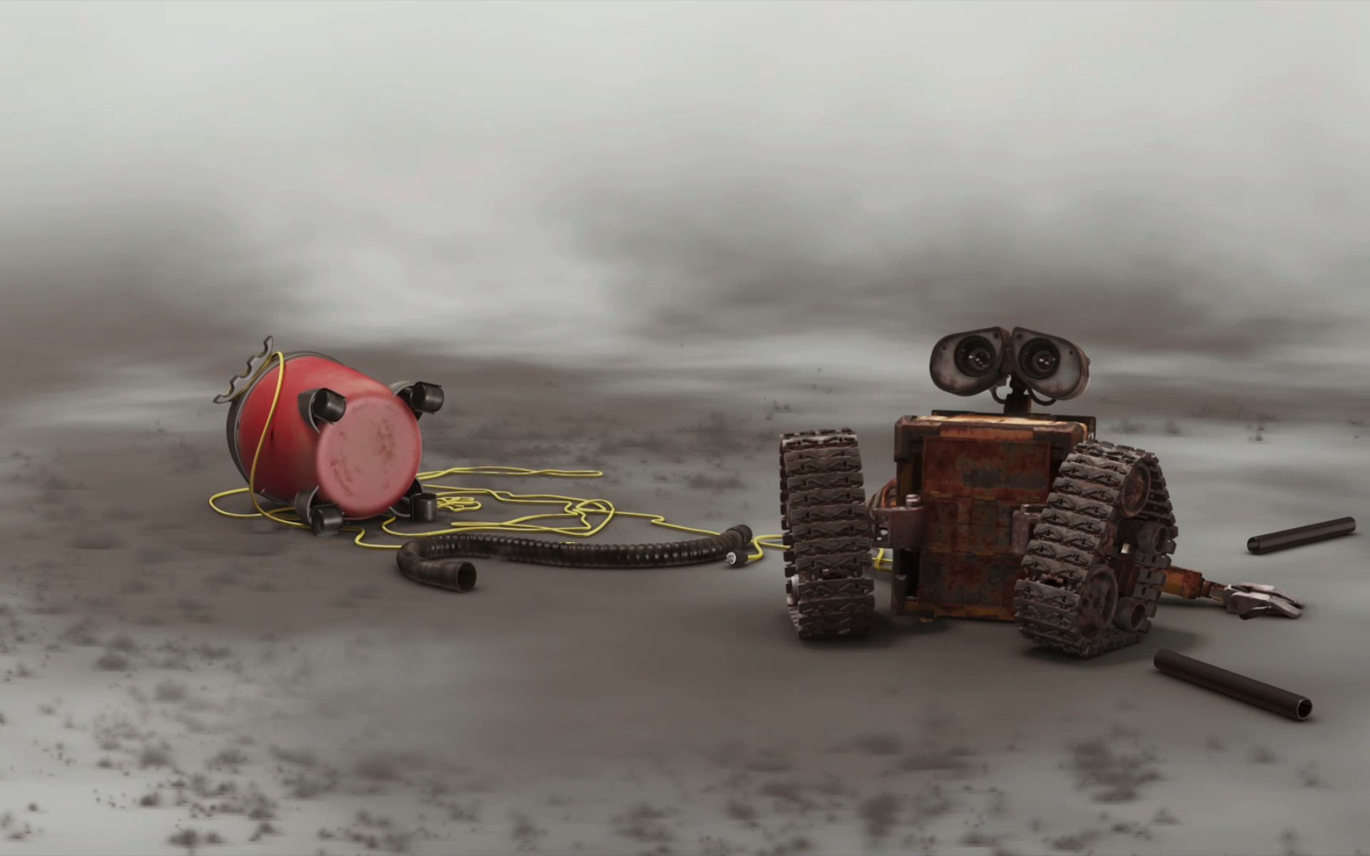 HD PC desktop wallpaper featuring Wall·E, the robot from the movie, sitting beside a red fire extinguisher on a gray, dusty surface under a cloudy sky.