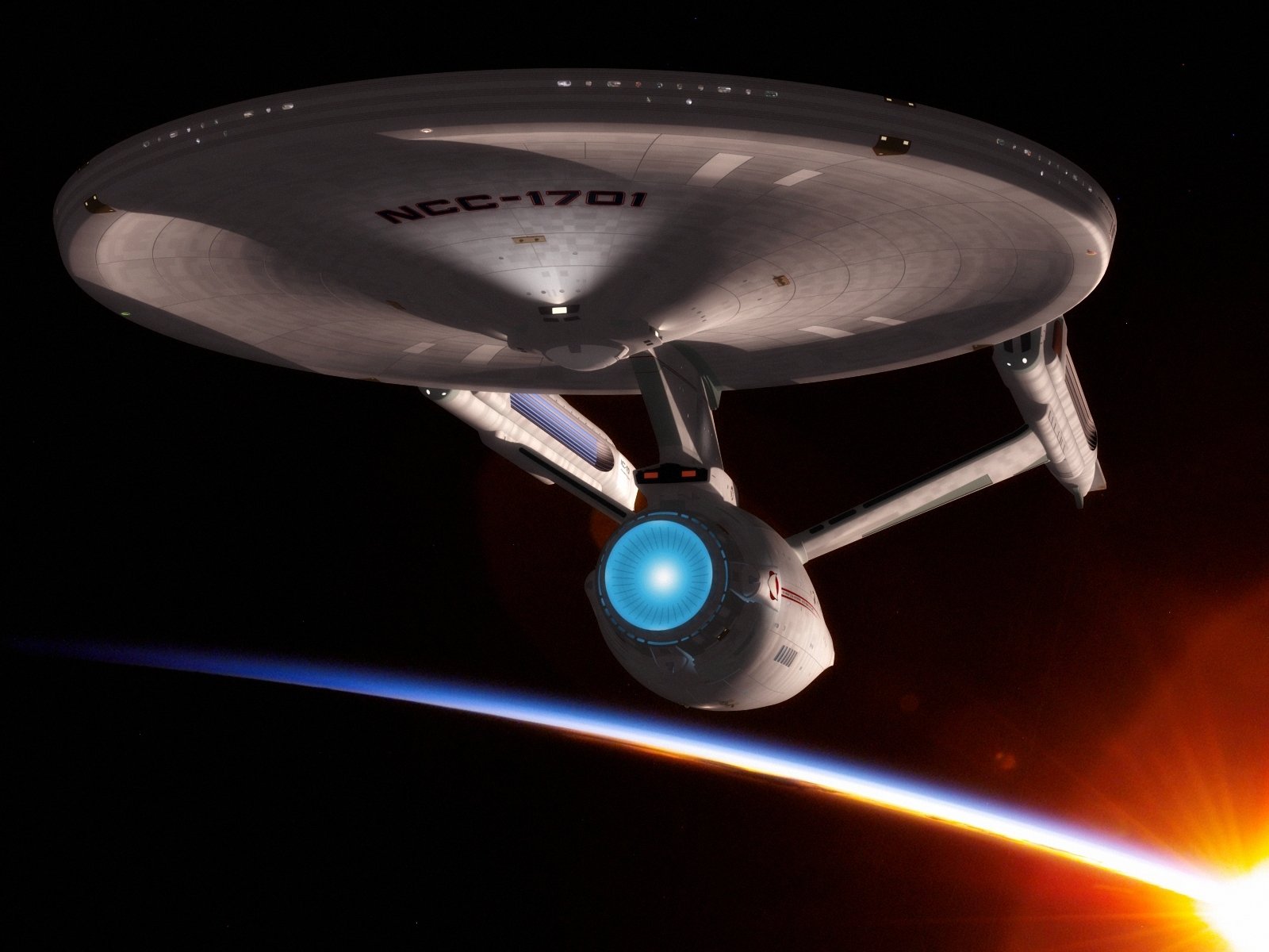 HD PC desktop wallpaper featuring the iconic Star Trek USS Enterprise NCC-1701 in deep space, capturing a classic sci-fi moment above a glowing planet.